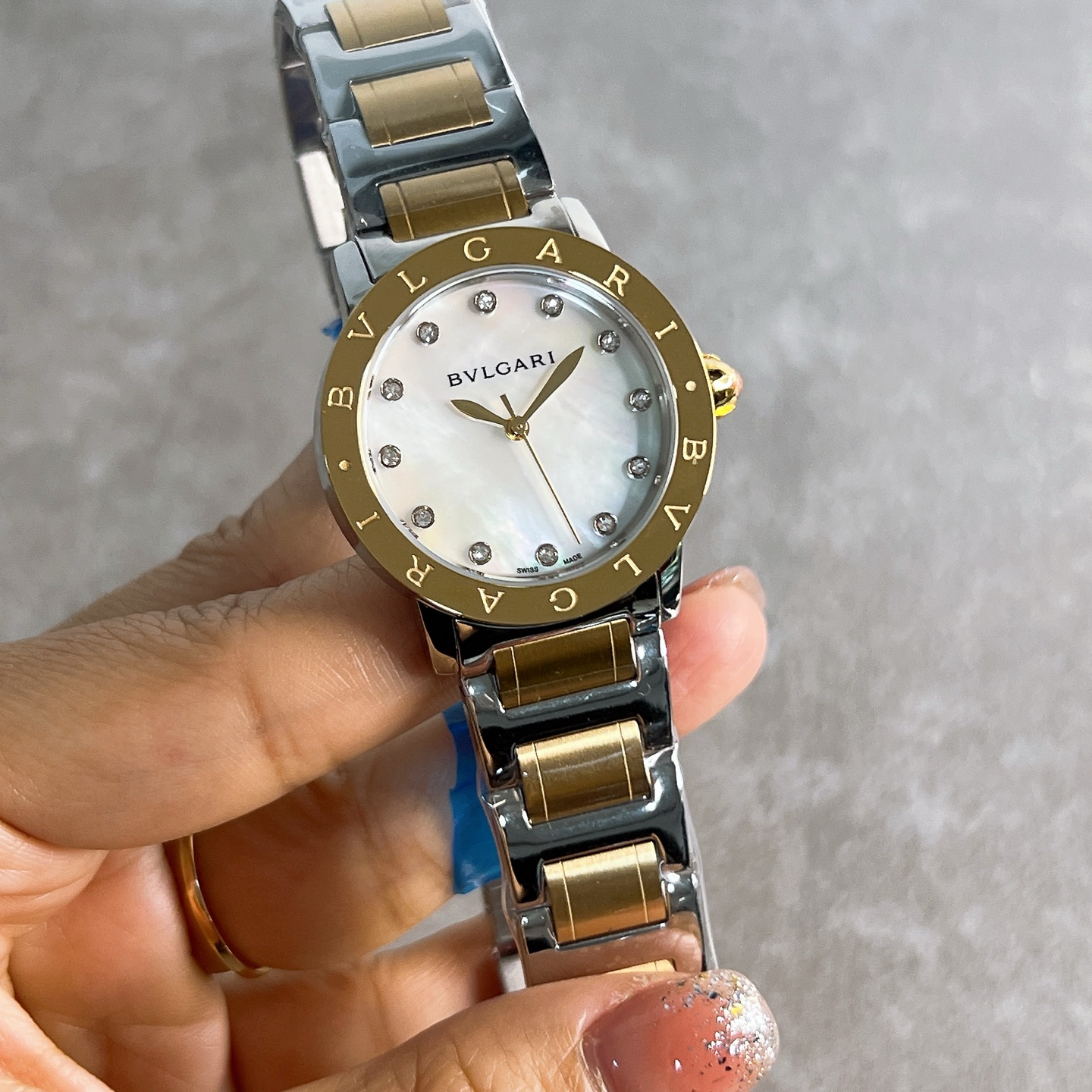 BVLGARI?BVLGARI collection luxury quality showcases unique charm with stainless steel strap, Bvlgari signature ruby crown, quality of the watch, size 33MM