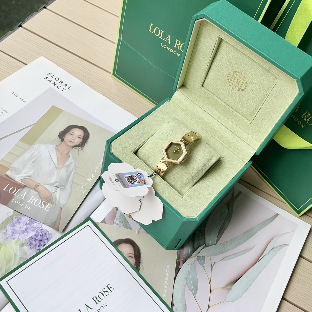 Batch ??350. New!! Lola Rose Hive collection, a niche luxury high-end women's watch!

This watch combines the classic Art deco style, with a double gem dial and a sparkling gold strap! Hexagonal elements, high-precision cut agate and the glittering gold b