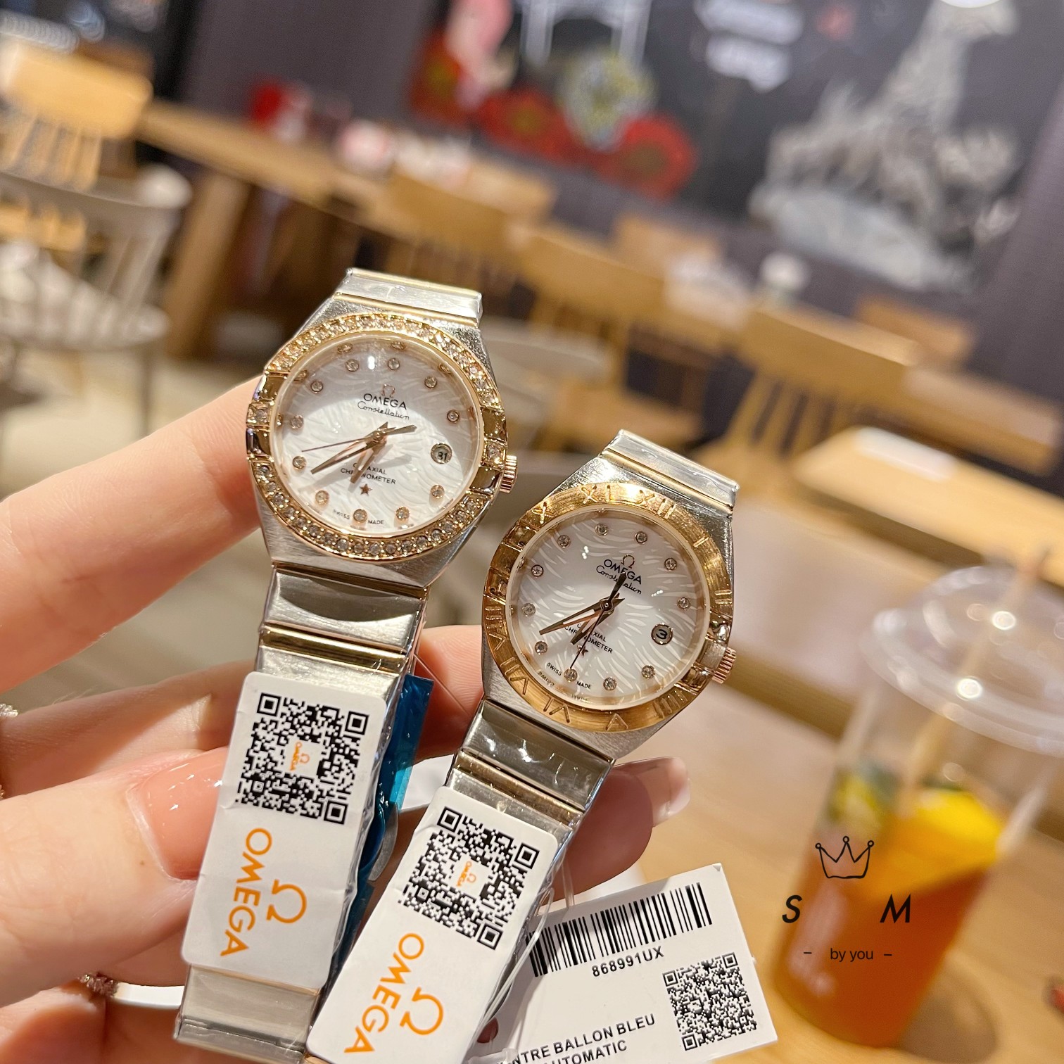 ????100. ?? Classic style timeless Full diamond bezel omega, Double Eagle Constellation collection with high quartz movement, butterfly double button clasp. ... Mineral wear-resistant glass material, inside and out, a unique and ingenious design! Size: 28