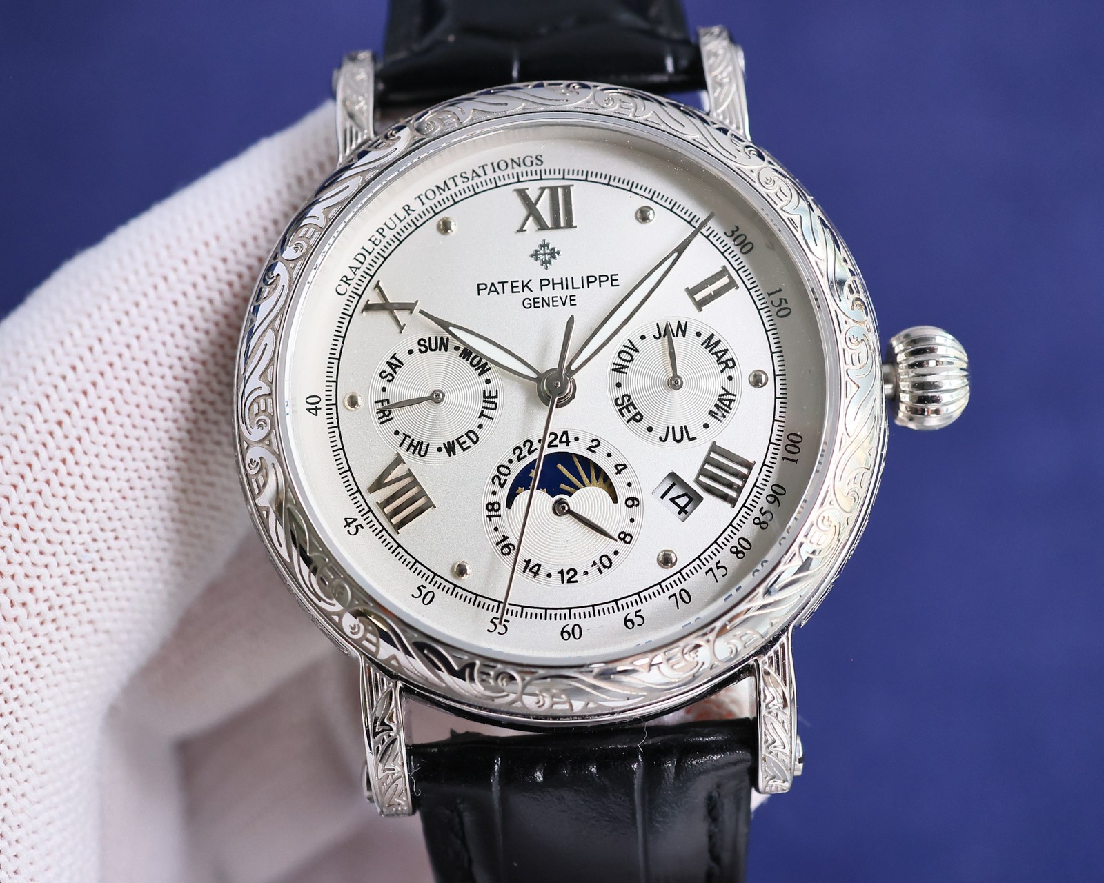 The Patek Philippe Complication collection - handcrafted - engraved watch - makes a stunning debut with a 42mm diameter that fits the average male hand size, perfect for both business and casual. The entire case is hand-engraved with patterns, creating a 