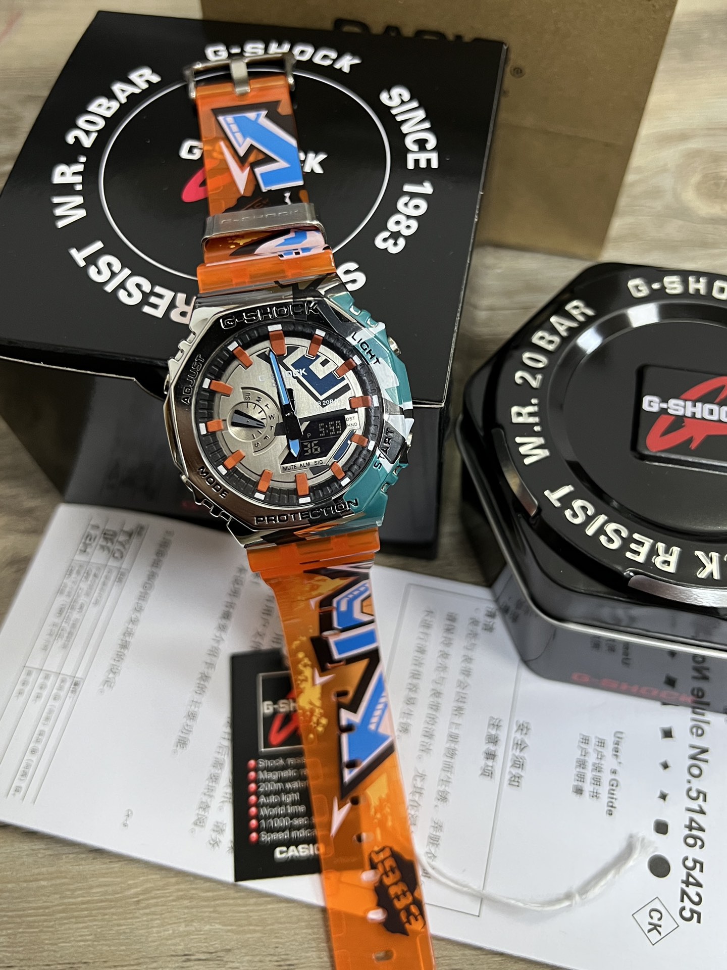 New CASIO official website now available! GM2100 G-SHOCK Country Oak metal case ECB-10YP ?? A distinctive octagonal style with shock resistance, countdown, stopwatch, LED lighting, world time, automatic calendar, daily alarm ?12/24 hour system, 49.3*44.4*