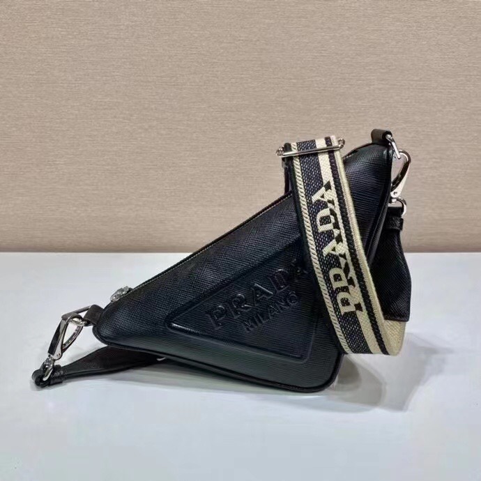 p750?? Embroidered webbed Triangle bag ??2VH155???? This triangle bag takes the iconic geometry of the P family and is made of the brand's signature Saffiano leather, featuring a distinctive cross and parallel pattern, large embossed triangular logo, favo
