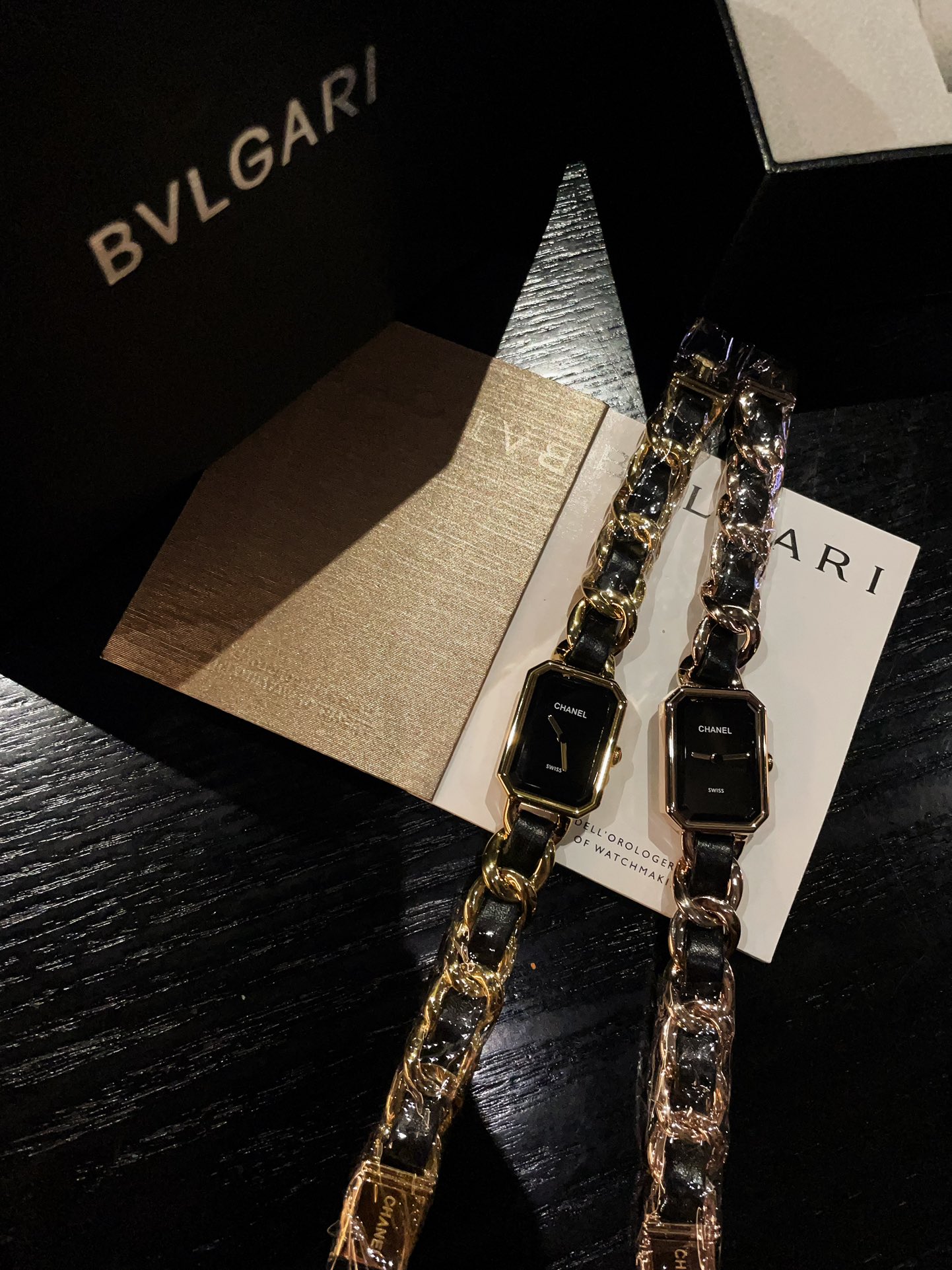 ?? 250
New Chanel Premiere, 28.1x 20mm, 7.65mm thick, stainless steel case plated with yellow K gold, black lacquered dial, crown set with cangular-shaped onyx, quartz movement, hour and minute display, stainless steel bracelet plated with yellow K gold i