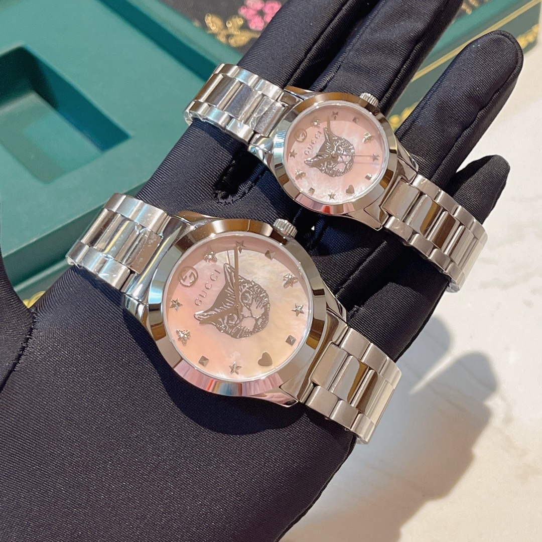??260 Gucci counter latest style. A small, polished stainless steel case, 29mm. Paired with the interlocking G crown, the highly creative cat-shaped ?? dial with star and planet patterns, Gucci hour markers: interlocking G, bee, star, rivet and heart, cal